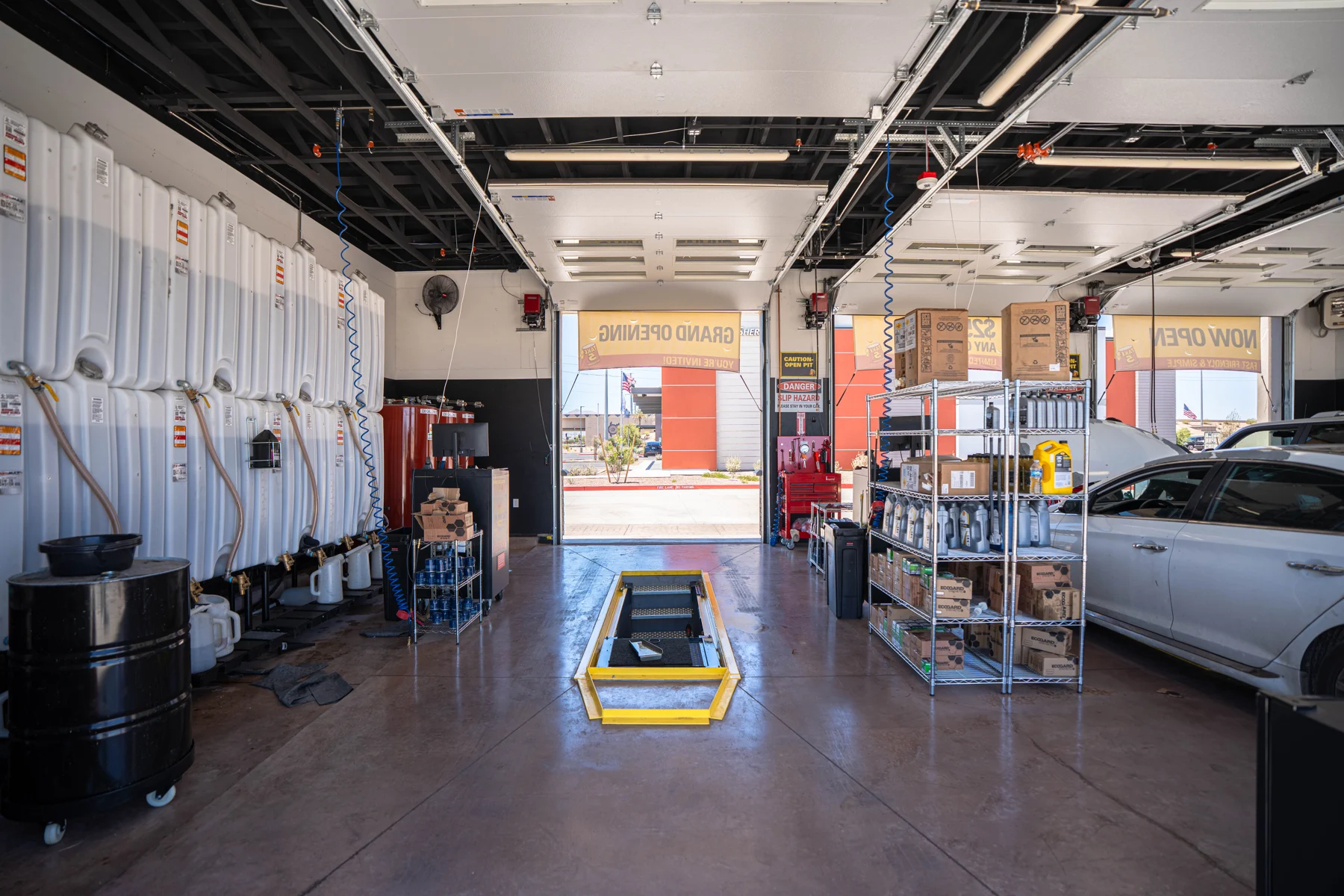 Service bay interior with vehicles