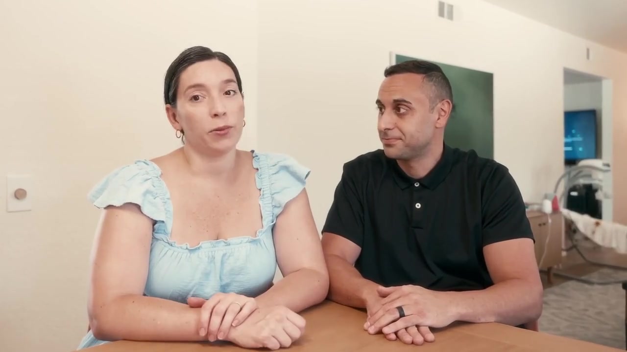 Homeowners seated at a table, from Revco's website video